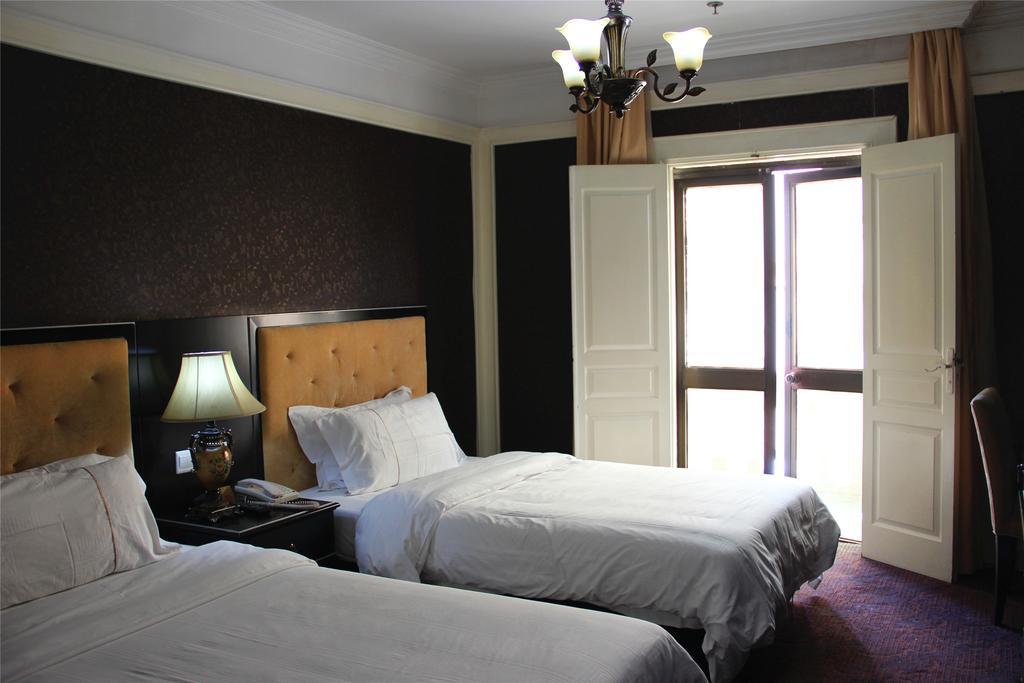Manhattan Jinling Hotel Шанхай Стая снимка